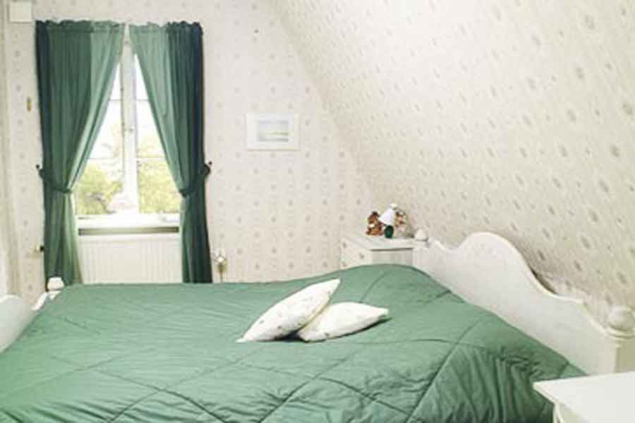tweepersoonskamer bij Sommarhagen in Boxholm in Zweden 